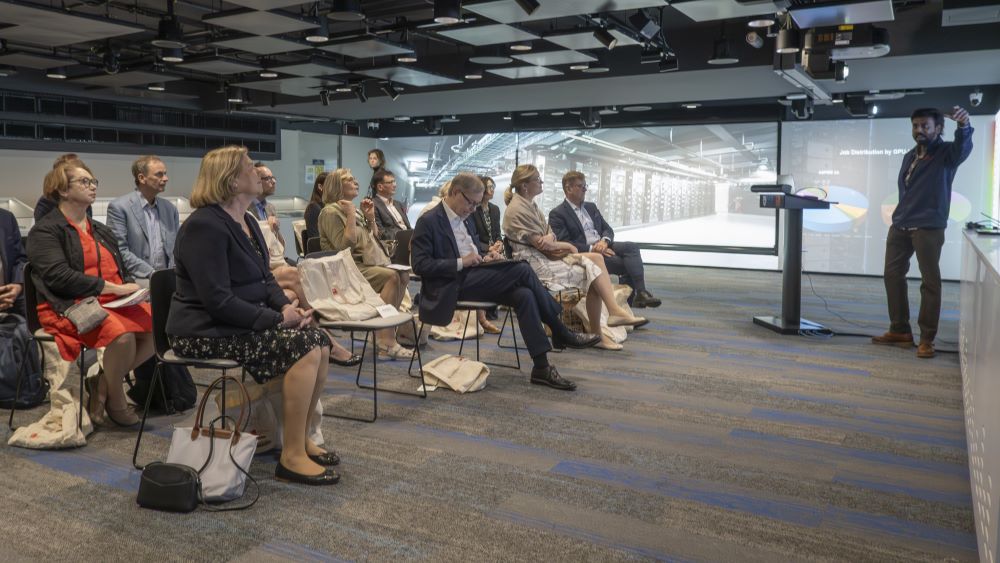 The Research and Innovation Council of Finland, together with the CSC, visited the National Supercomputing Center (NSCC) in December 2025. CSC and NSCC are collaborating closely; director Mari Walls (sitting in the front) also gave a review on the collaboration. Photo – Mika Tirronen